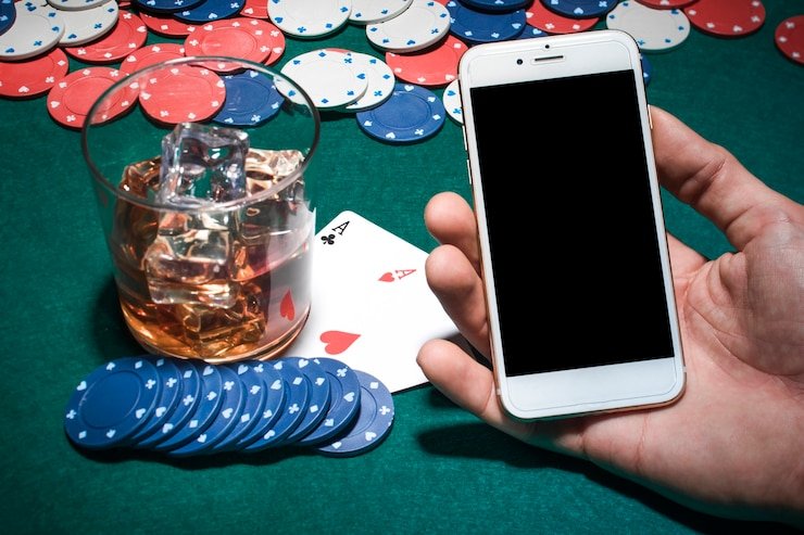 Antarmuka aplikasi jepangtoto di ponsel menampilkan pertandingan Piala AFF dan meja live dealer